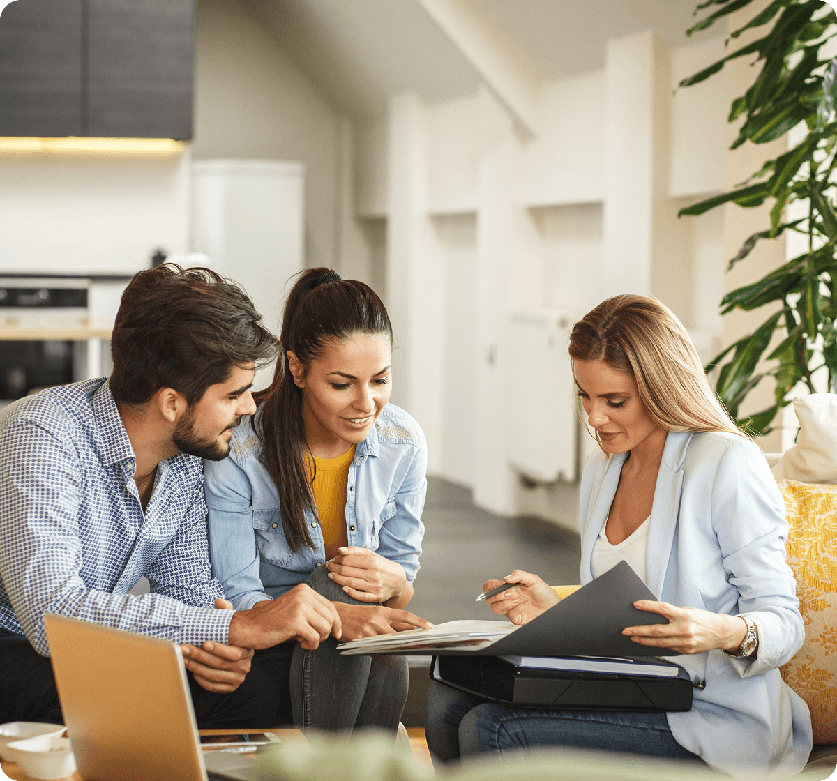 Team discussing documents in office